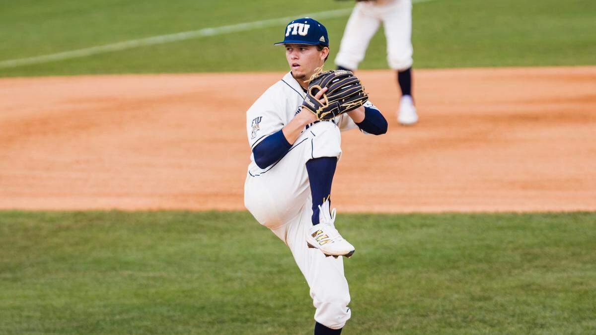 FIU pitcher Ryan Cabarcas, an Plantation American Heritage alum, is seen here pitching against St. Thomas University last season. Cabarcas will start on Friday night when the Panthers open the 2023 season against George Mason.