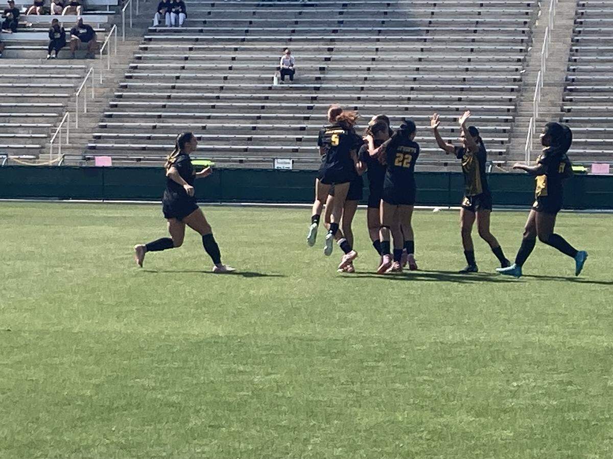 American Heritage’s girls’ soccer team celebrates its lone goal during their Class 4A state girls’ soccer semifinal win over Orlando Bishop Moore on Thursday afternoon at Spec Martin Stadium in DeLand, Fla.