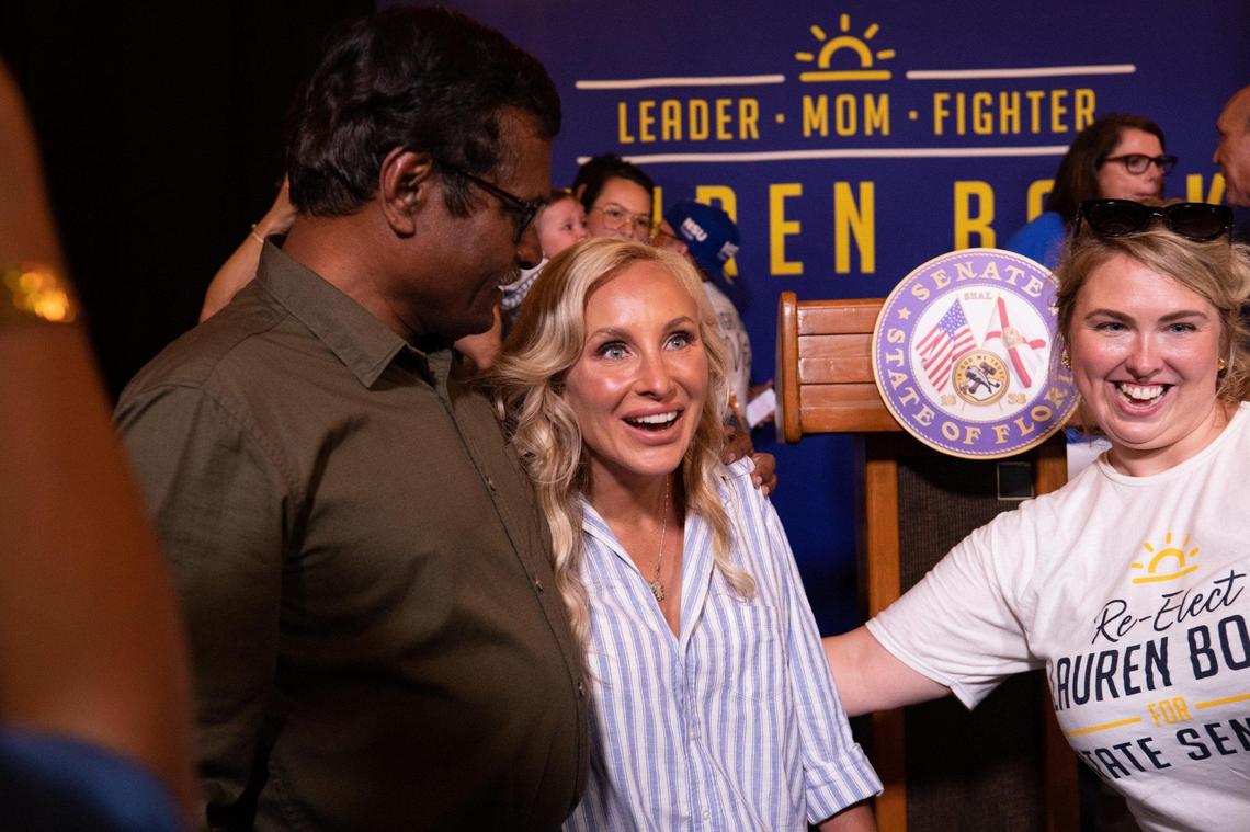 Lauren Book hugs her supporters as she reacts to her win of Florida Senate District 35 at her victory party at Agave Bandido restaurant in Pembroke Pines, Florida on election night, Tuesday, August 23, 2022.