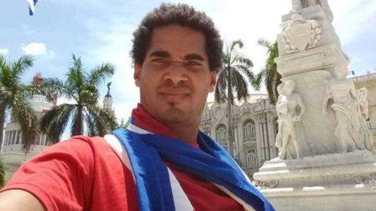 Cuban performance artist Luis Manuel Otero Alcántara in Havana staging his work “The Flag Belongs to All of Us.”