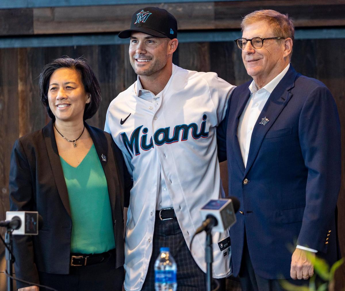 Miami, FL- November 3, 2022 - Skip Schumaker, center, was named the 16th manager in Marlins history. Making the announcement are Marlins general manager Kim Ng, left and Marlins chairman and principal owner Bruce Sherman, right. This will be the first managerial job for Schumaker, who played 11 Major League seasons with the Cardinals, Dodgers and Reds from 2005-15
