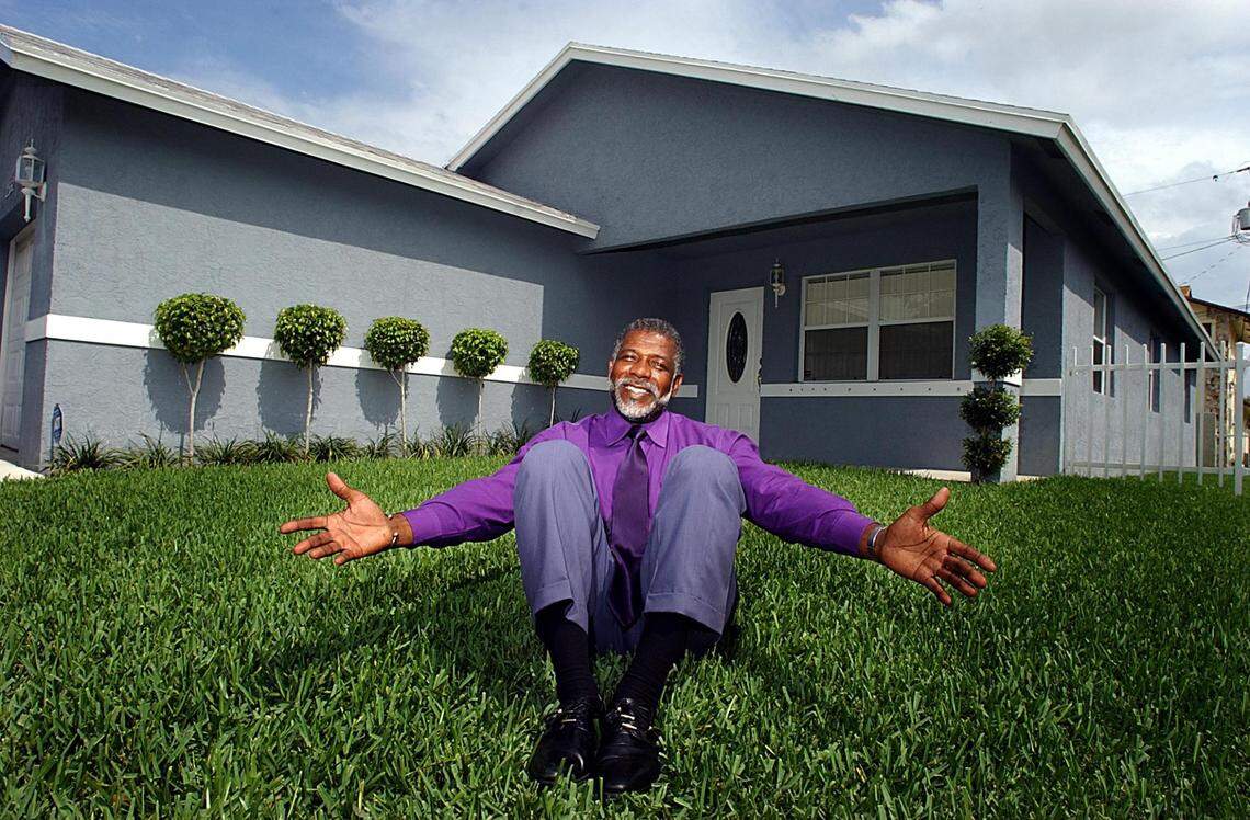 broward 5/21/02 walter michot/mhs Liberia Economic & Social Development Inc. Here Executive Director, Henry L. Graham sits in front of an affordable home purchased by John and Vickiie Dinkins, 2352 Cody Street, to illustrate story on housing in Liberia.