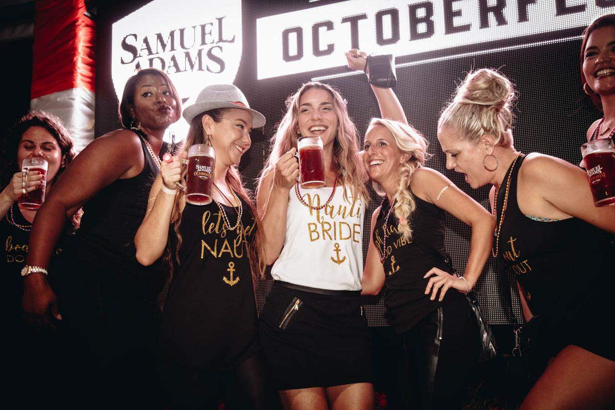 Beer makes everybody happy at the Sam Adams Octoberfest in Wynwood.