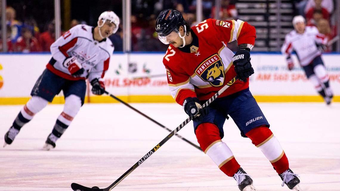 Florida Panthers defender MacKenzie Weegar (52) chases the puck during the first period of an NHL game against the Washington Capitals at FLA Live Arena in Sunrise, Florida, on Tuesday, November 30, 2021.