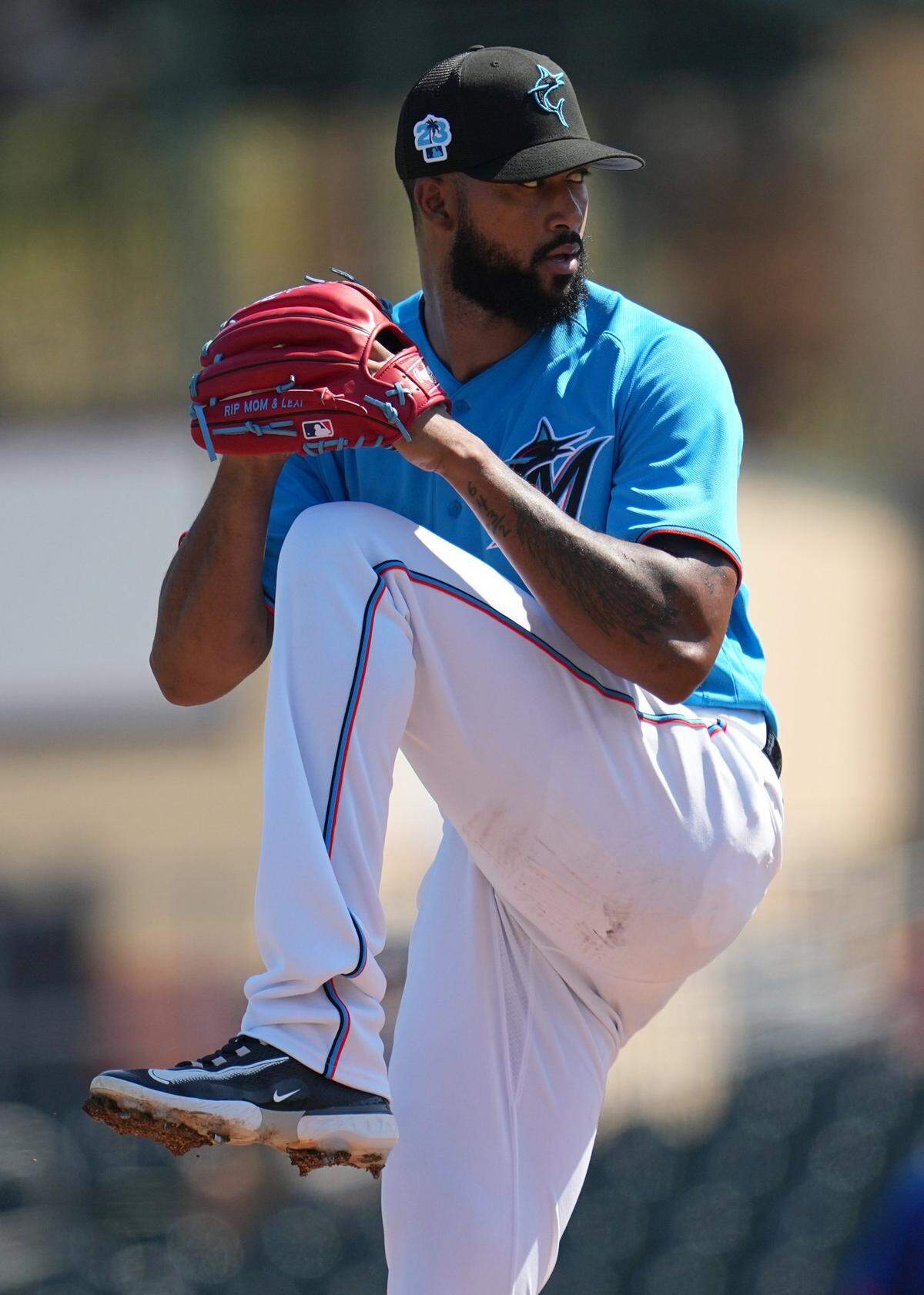 Mar 1, 2023; Jupiter, Florida, USA; Miami Marlins starting pitcher Sandy Alcantara (22) pitches against the New York Mets in the second inning at Roger Dean Stadium. Mandatory Credit: Jim Rassol-USA TODAY Sports