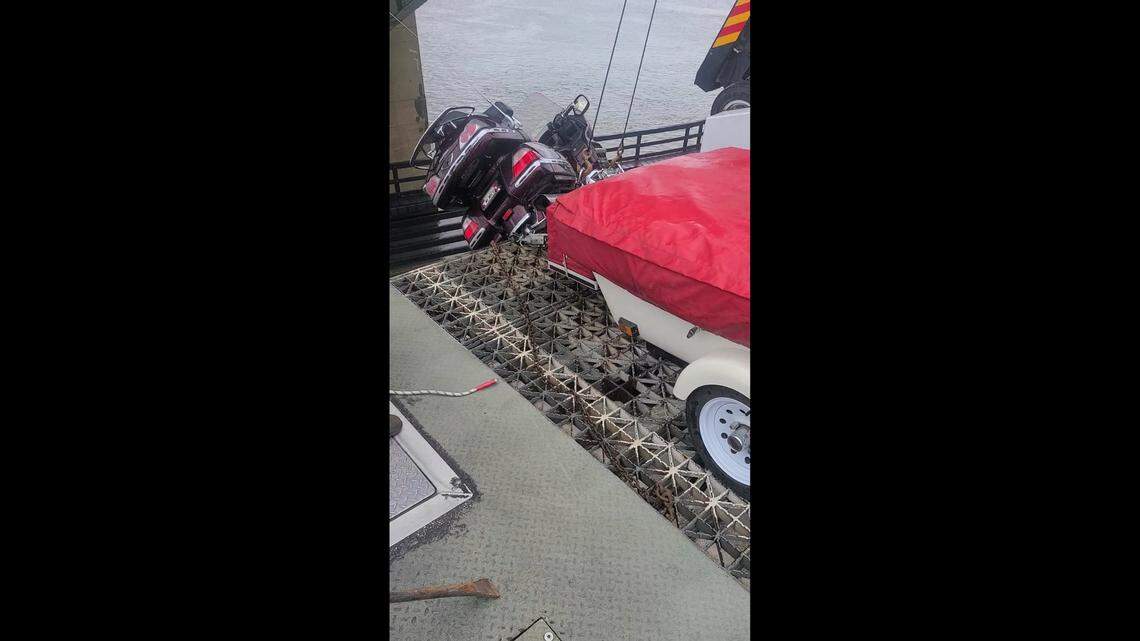 The motorcycle was kept suspended by a trailer hitch