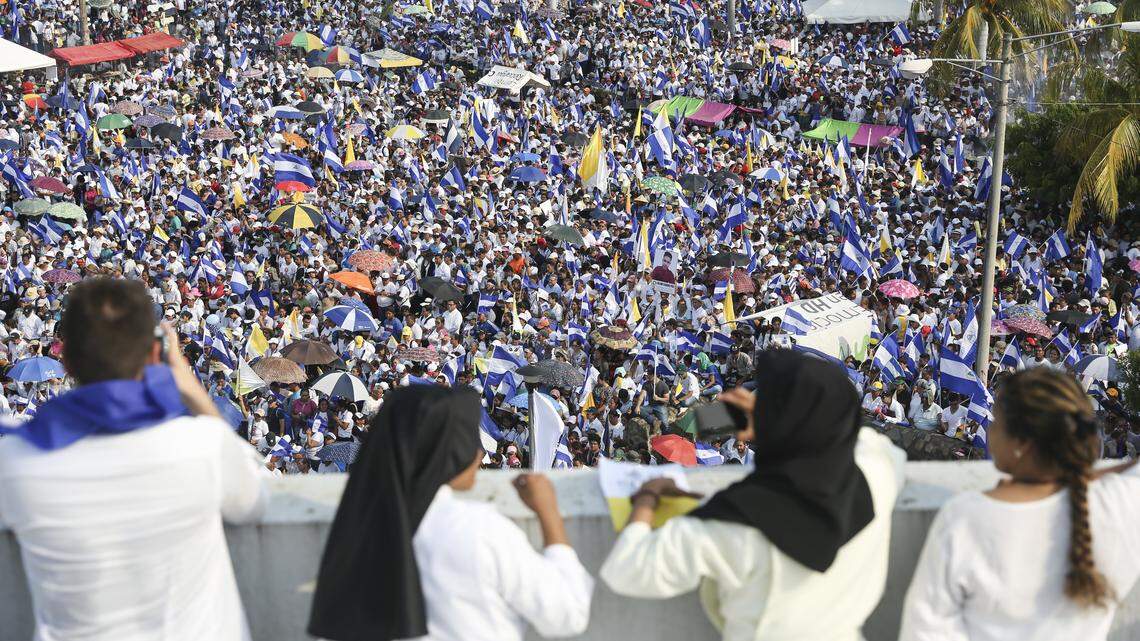Thousands of people congregate outside Managua's Cathedral during a massive march called by the Catholic Church as a day of prayer, in Managua, Nicaragua, Saturday, April 28, 2018. After the largest protests Nicaragua has seen in at least 40 years the government of President Daniel Ortega has been left weakened but still in control of all the levers of government and has a monopoly on the use of force. (AP Photo/Alfredo Zuniga)