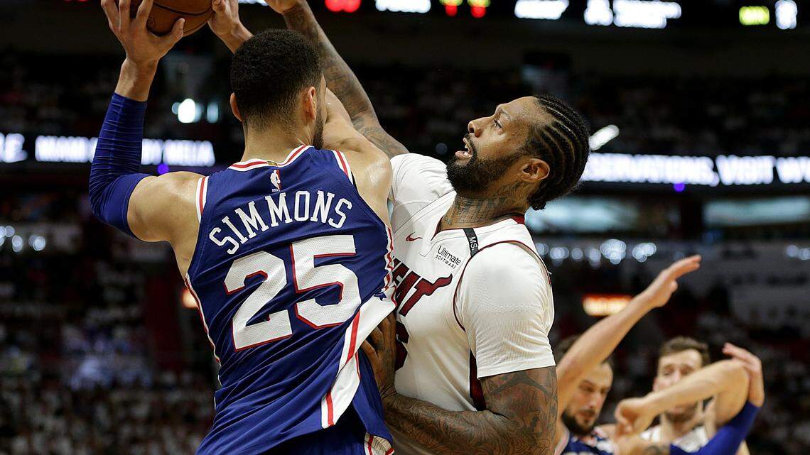 Heat forward James Johnson defends against Philadelphia's guard Ben Simmons in the in the fourth quarter of the playoff: round 1 game 4 between the Miami Heat and the Philadelphia 76ERS, at AmericanAirlines Arena in Miami on Saturday, April 21, 2018.