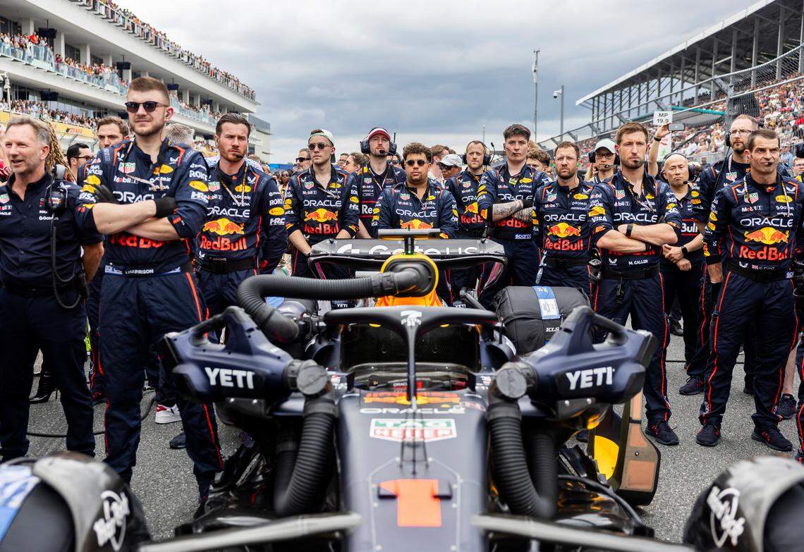 Red Bull Racing crew members are seen next to Max Verstappen’s car ahead of the Formula One Miami Grand Prix at the Miami International Autodrome on Sunday, May 4, 2025, in Miami Gardens, Fla.