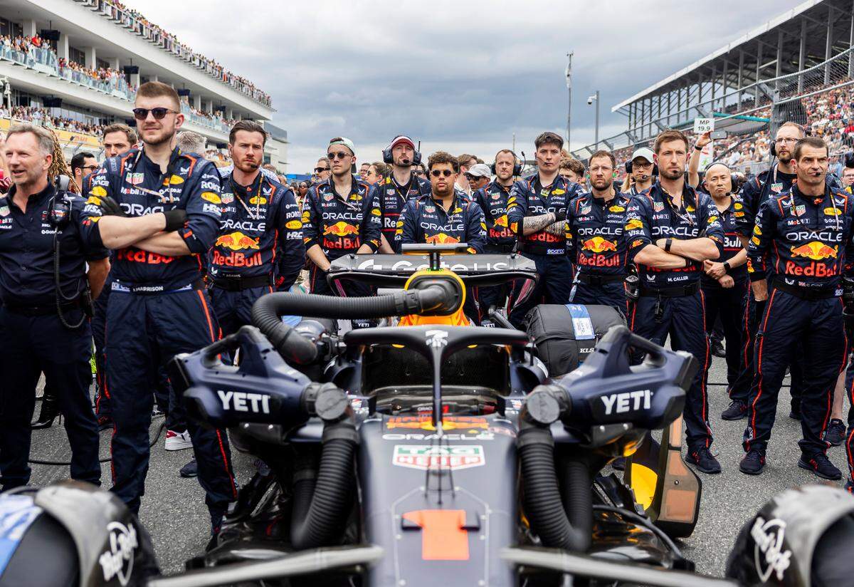 Red Bull Racing crew members are seen next to Max Verstappen’s car ahead of the Formula One Miami Grand Prix at the Miami International Autodrome on Sunday, May 4, 2025, in Miami Gardens, Fla.