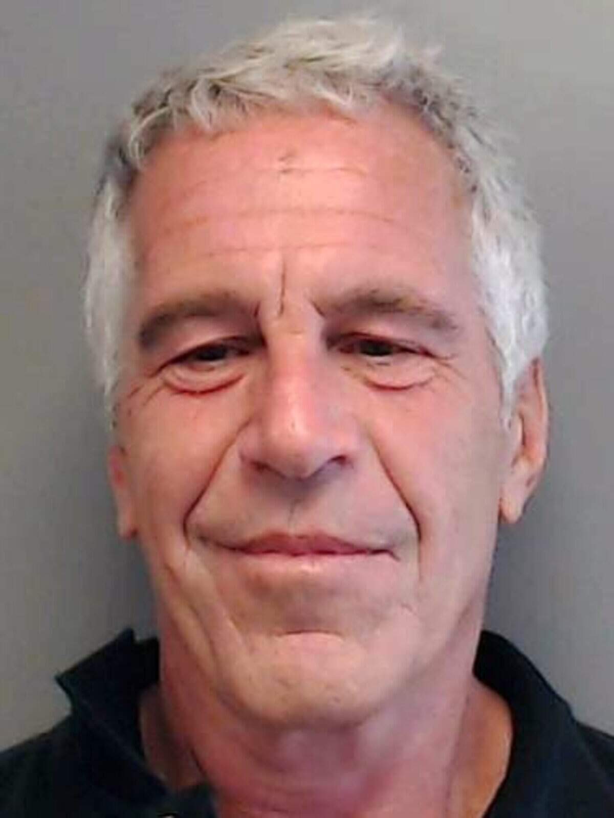 In this handout provided by the Florida Department of Law Enforcement, Jeffrey Epstein poses for a sex offender mugshot after being arrested in Palm Beach in July 2006 on a count of soliciting prostitution.