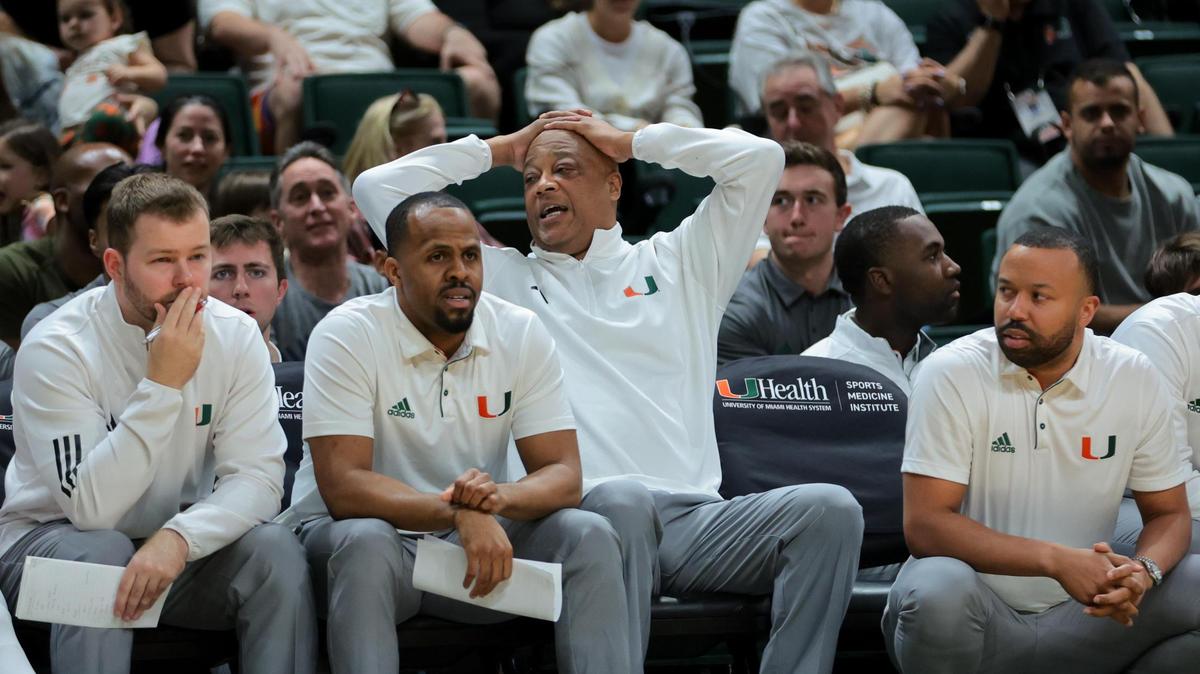 Jan 18, 2025; Coral Gables, Florida, USA; Miami Hurricanes interim head coach Bill Courtney reacts from the bench against the Southern Methodist Mustangs during the first half at Watsco Center. Mandatory Credit: Sam Navarro-Imagn Images