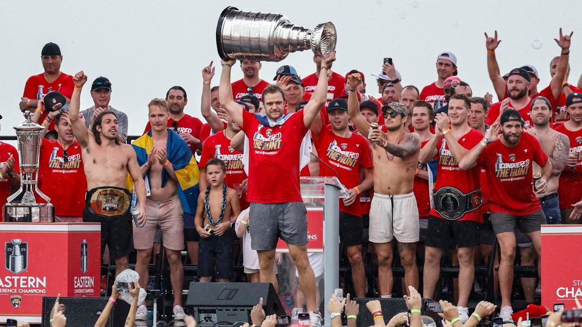Florida Panthers center Aleksander Barkov (16) lifts the Stanley Cup during the Florida Panthers Stanley Cup victory rally along A1A in Fort Lauderdale, Florida on Sunday, June 30, 2024.