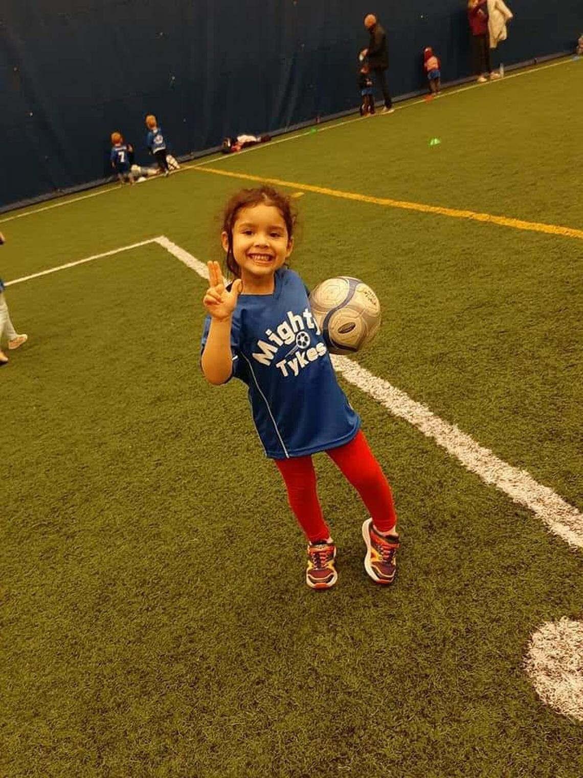 Delvalle’s grandaughter, 4-year-old Aiva, smiles for the camera during soccer practice in Chicago, IL.