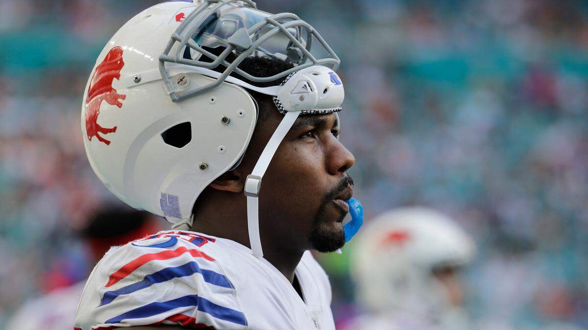Buffalo Bills defensive end Jerry Hughes (55) watched the game from the sidelines, during the second half of an NFL football game against the Miami Dolphins, Sunday, Dec. 2, 2018, in Miami Gardens, Fla.