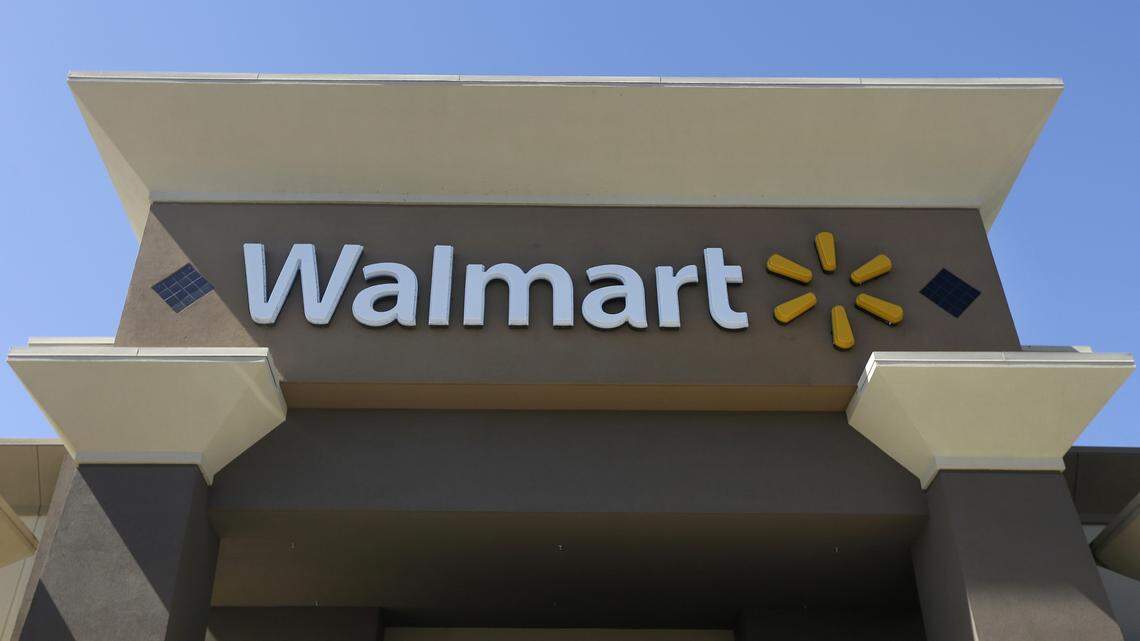 This Sept. 19, 2013, file photo, shows the sign of a Wal-Mart store in San Jose, Calif.