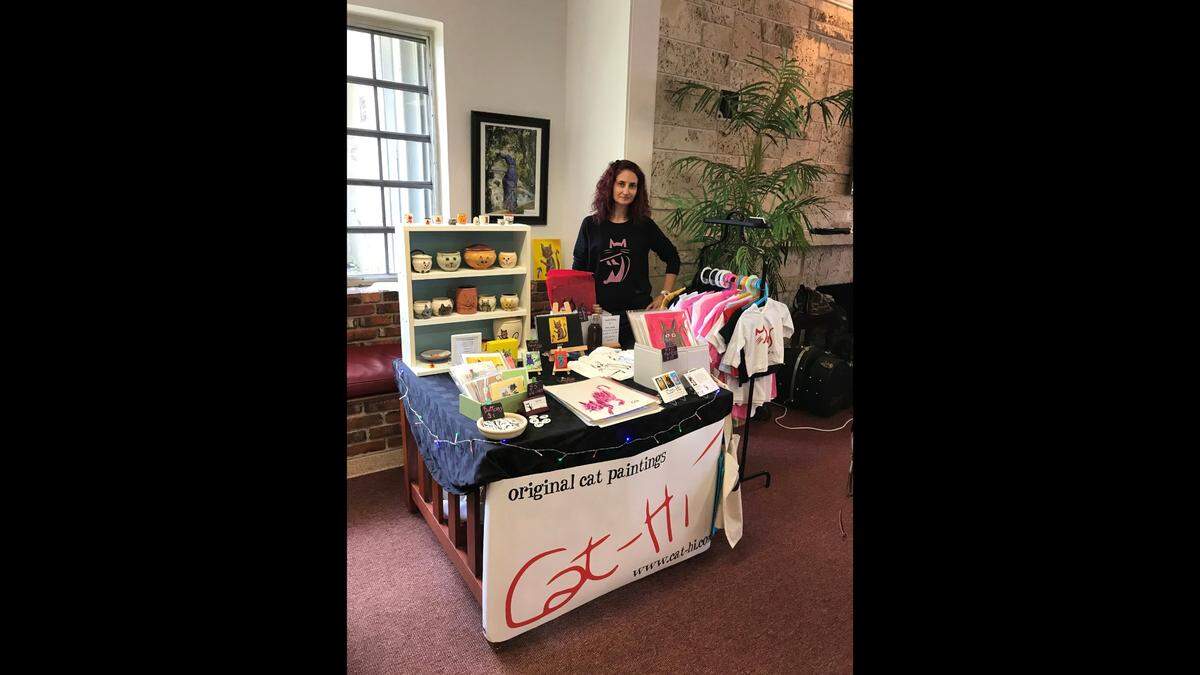 Cathi Marro and popular booth Cat-Hi will again be part of the artisan fair at Brockway Memorial Library in Miami Shores. This photo was take in 2019.