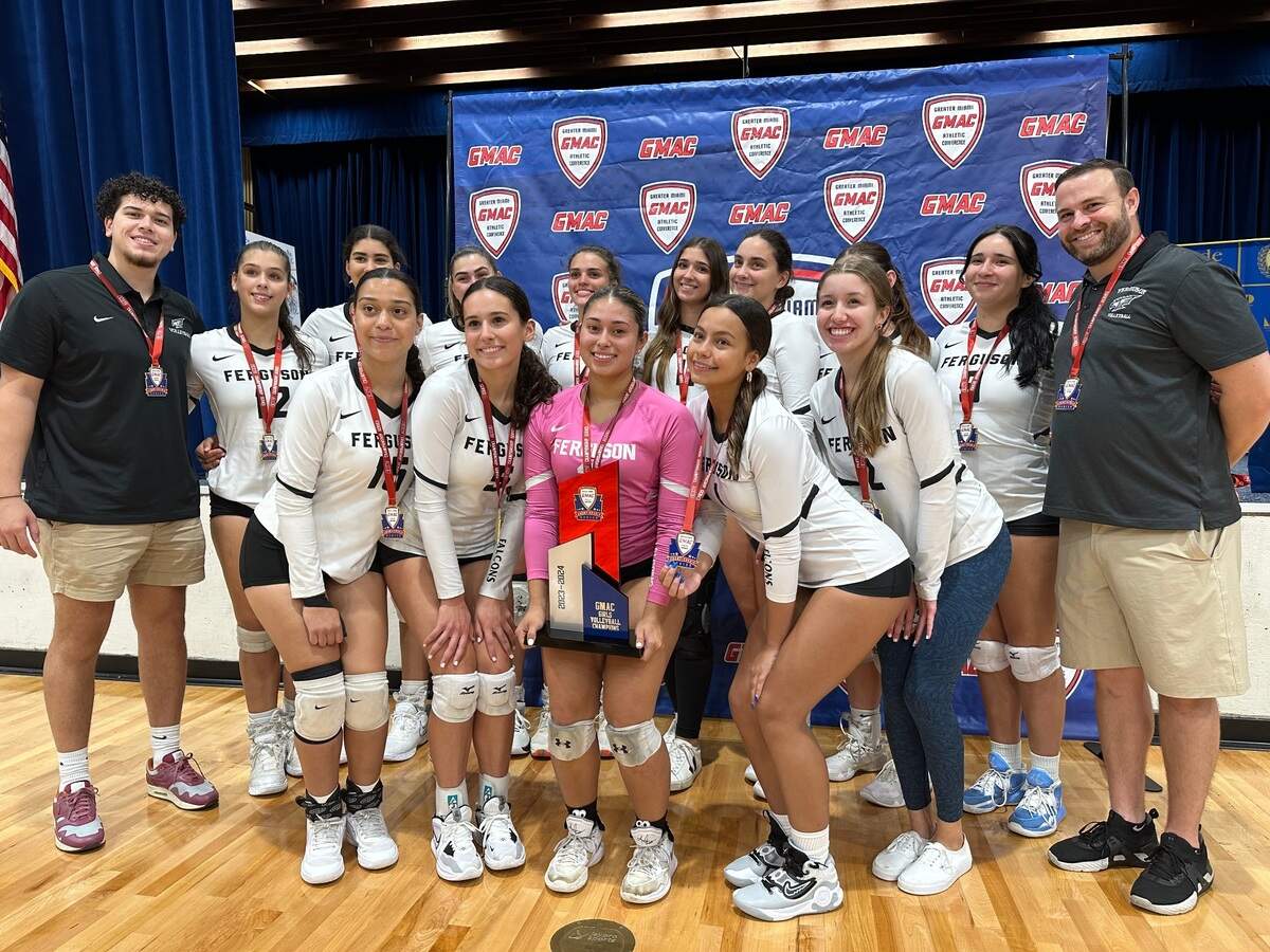 Ferguson’s girls’ volleyball team celebrates its third consecutive GMAC championship after beating Miami Coral Reef in the finals Saturday at Miami Dade College’s Kendall campus gym.