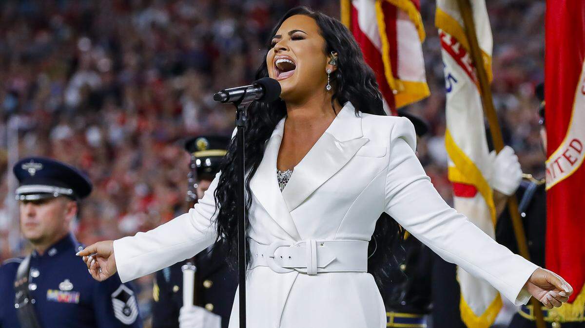 Demi Lovato performs the National anthem before the San Francisco 49ers face off against the Kansas City Chiefs during Super Bowl 54 at Hard Rock Stadium on Sunday, February 2, 2020 in Miami Gardens, Florida.