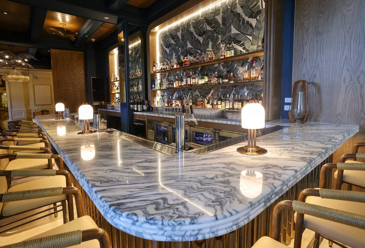 The Rum Bar has been completely redesigned with new light fixtures, floors, marble bar, and decor, as part of the Ritz-Carlton's renovation. Taken on Tuesday, December 16, 2025, in Key Biscayne, Florida.