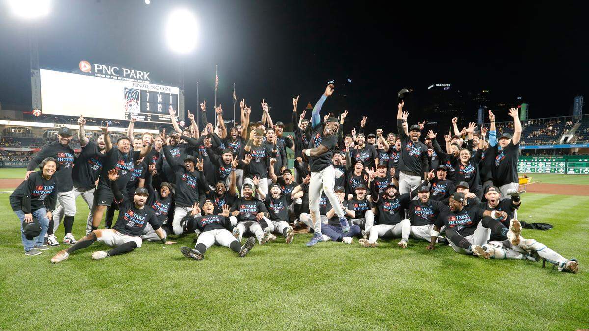 Sep 30, 2023; Pittsburgh, Pennsylvania, USA; The Miami Marlins celebrate on the field after defeating the Pittsburgh Pirates at PNC Park to secure a berth in the 2023 MLB playoffs.