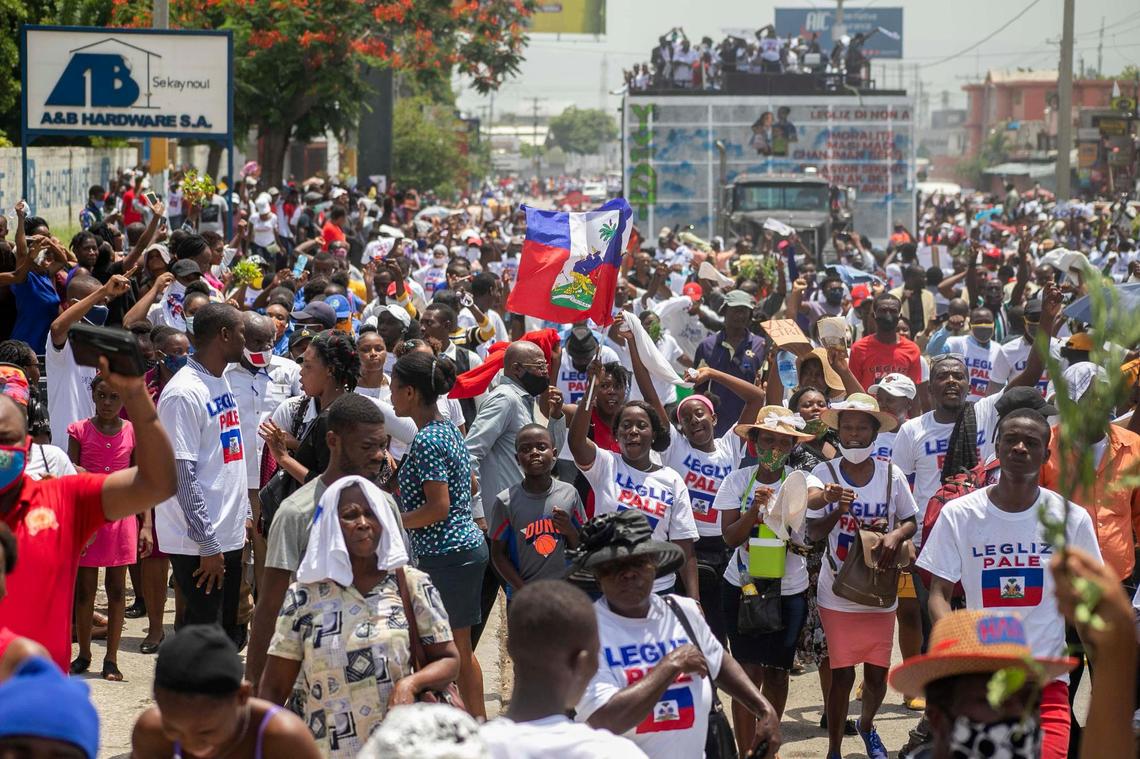 Protesters and church members march and pray during a protest against gay rights in Port-au-Prince on July 26, 2020.