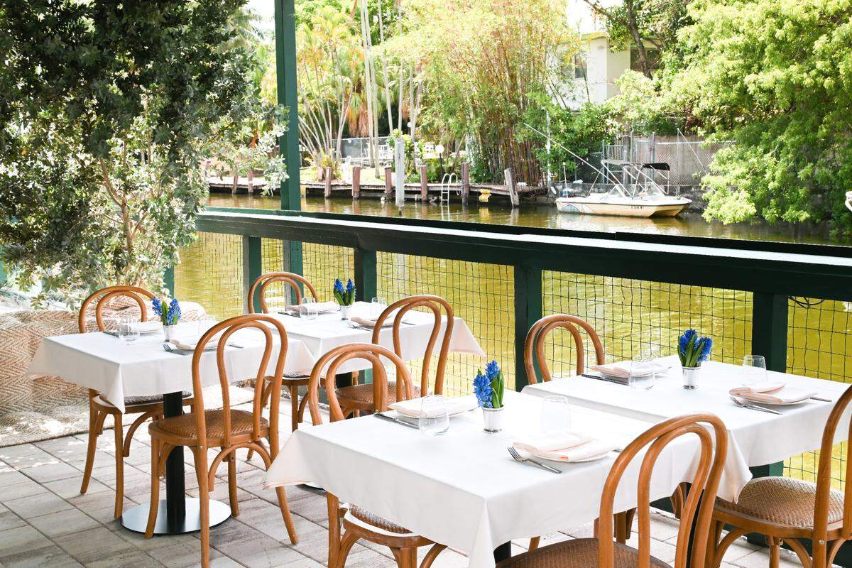 The outdoor canal-side patio at San Lorenzo restaurant in Miami.