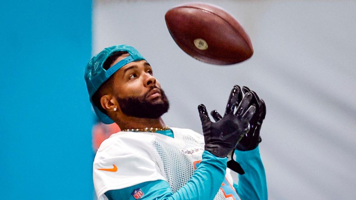 Miami Dolphins wide receiver Odell Beckham Jr. (3) tosses a football during practice at the Baptist Health Training Complex in Miami Gardens, Florida on Wednesday, June 5, 2024.