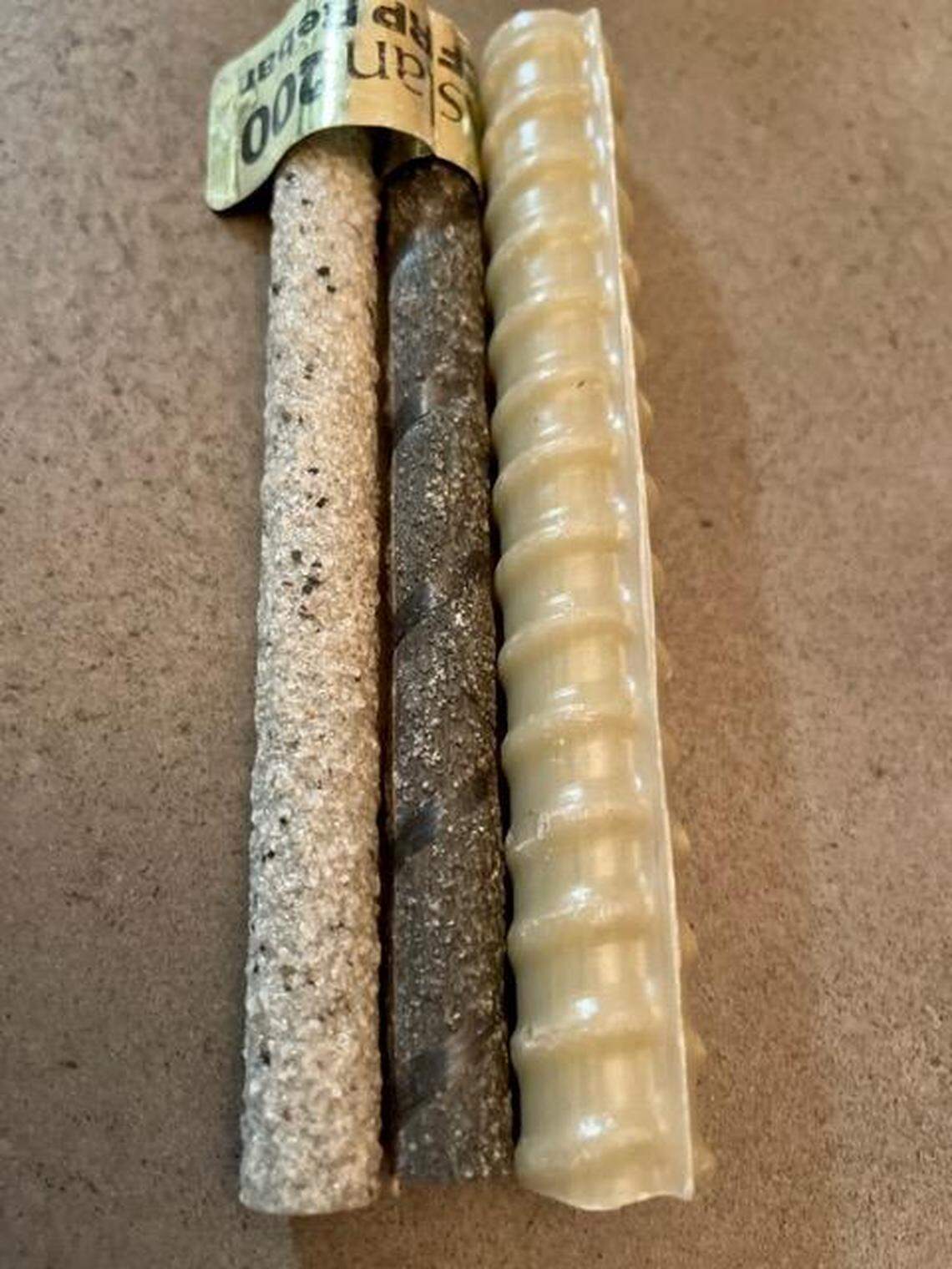 High-tech rebar. From left to right, glass fiber reinforcing bar, carbon fiber-reinforced and epoxy coated rebars. According to Christopher Ferraro, an assistant professor at the University of Florida Department of Civil & Coastal Engineering, the UF’ epoxy-coated steel rebars are very prone to damage during shipping and construction that can greatly reduce the rust resistance of the coated steel. The two fiber bars are much stronger and lighter than steel but also more brittle.