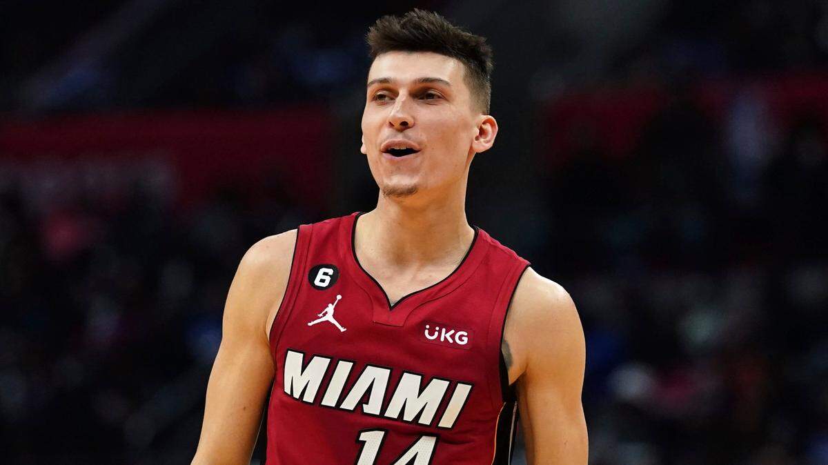 Miami Heat guard Tyler Herro (14) smiles after Miami scored during the second half of an NBA basketball game against the Los Angeles Clippers on Monday, Jan. 2, 2023, in Los Angeles.