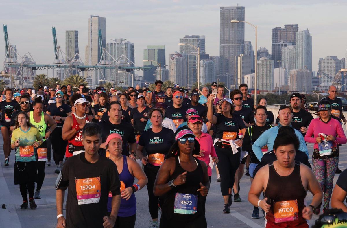 Runners make their way toward Fifth Street in Miami Beach on the MacArthur Causeway during the 18th annual Life Time Miami Marathon and Half Marathon, Feb. 9, 2020. There were more than 20,000 combined runners registered for the marathon and half marathon. The race was canceled in 2021 due to COVID and will return Sunday, Feb. 6.