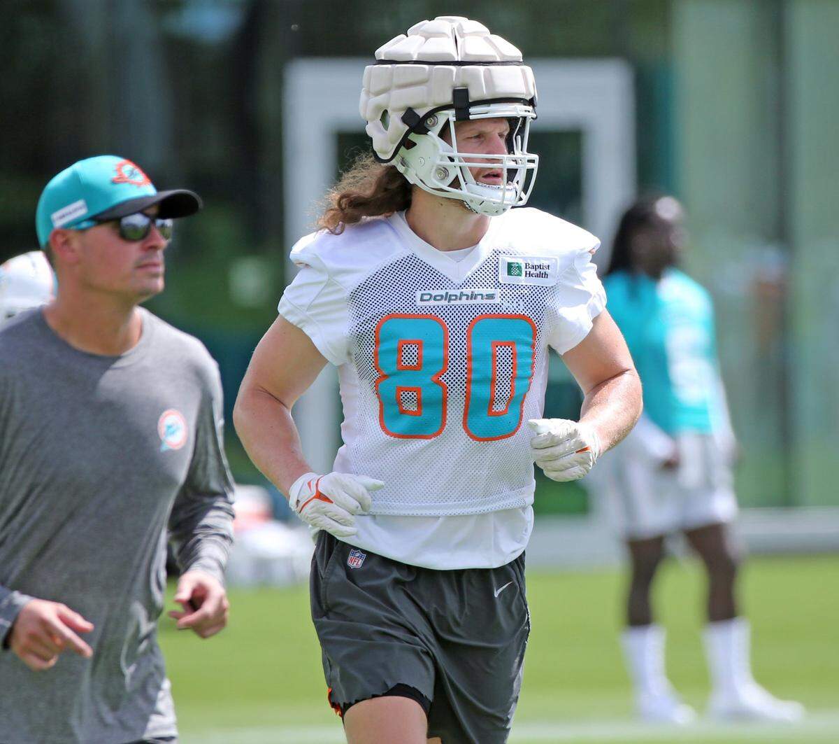 Miami Dolphins tight end Adam Shaheen (80) runs during practice at Baptist Health Training Complex in Miami Gardens on Friday, July 29, 2022.