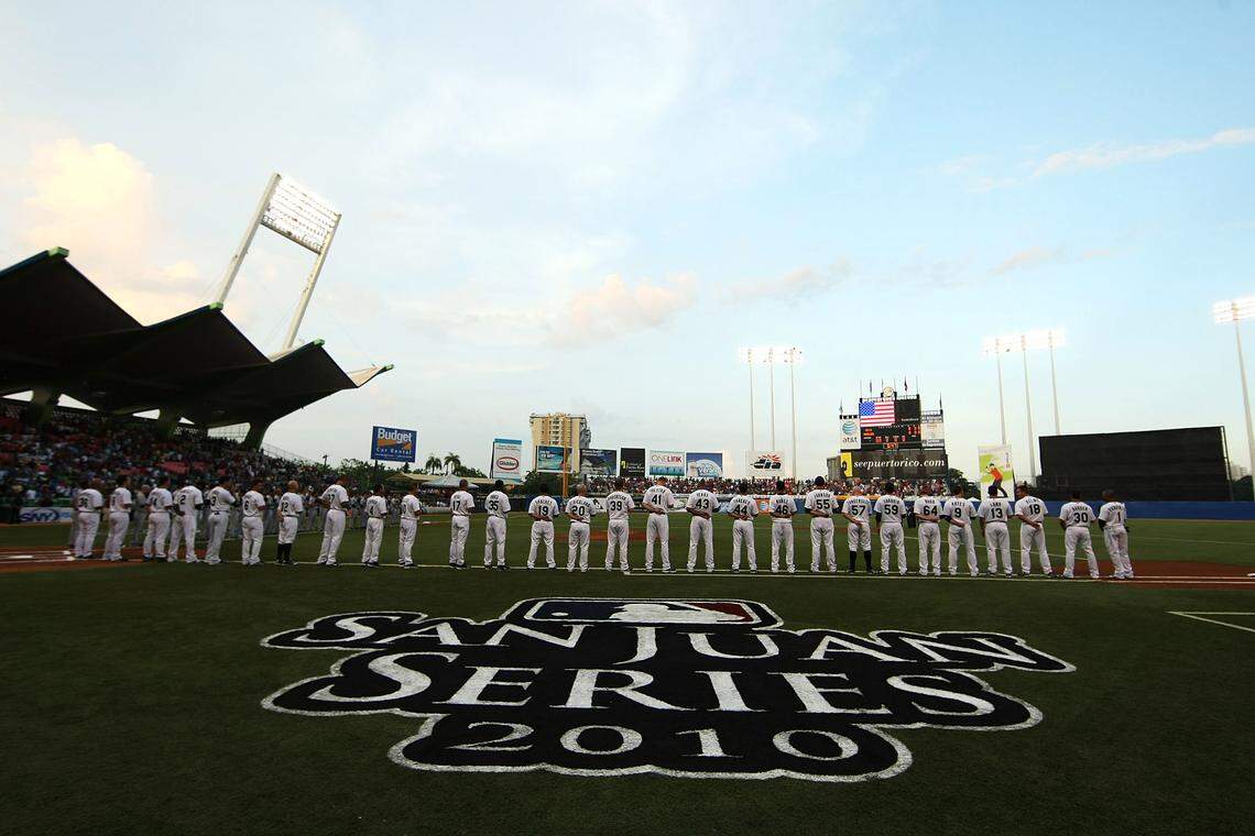 SAN JUAN, PUERTO RICO - JUNE 28: The Florida Marlins and The New York Mets stand for the National Anthem before their game at Hiram Bithorn Stadium on June 28, 2010 in San Juan, Puerto Rico. (Photo by Al Bello/Getty Images)