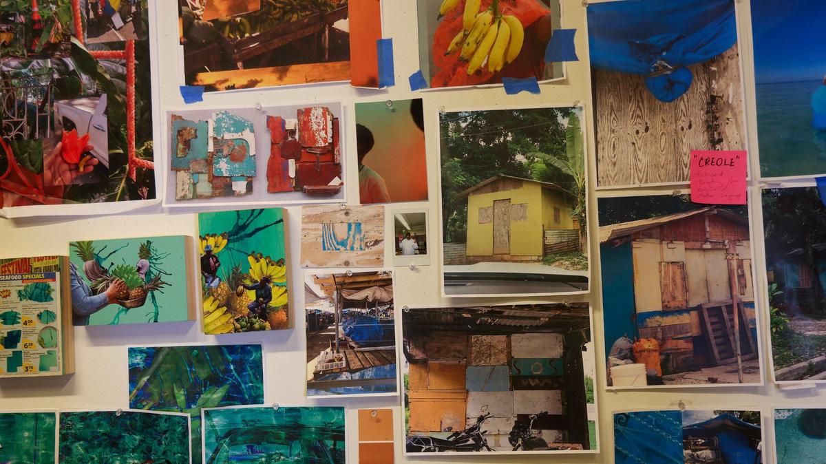 The wall in Cornelius Tulloch’s studio at the Bakehouse Art Complex is full of photographs and other images he uses for inspiration.