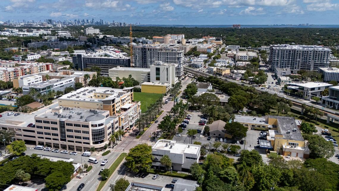 Aerial view of South Miami’s city hall and police station, the yellow buildings on lower right corner between Sunset Drive and U.S. and the Metrorail, on Tuesday, Oct. 1, 2024.
