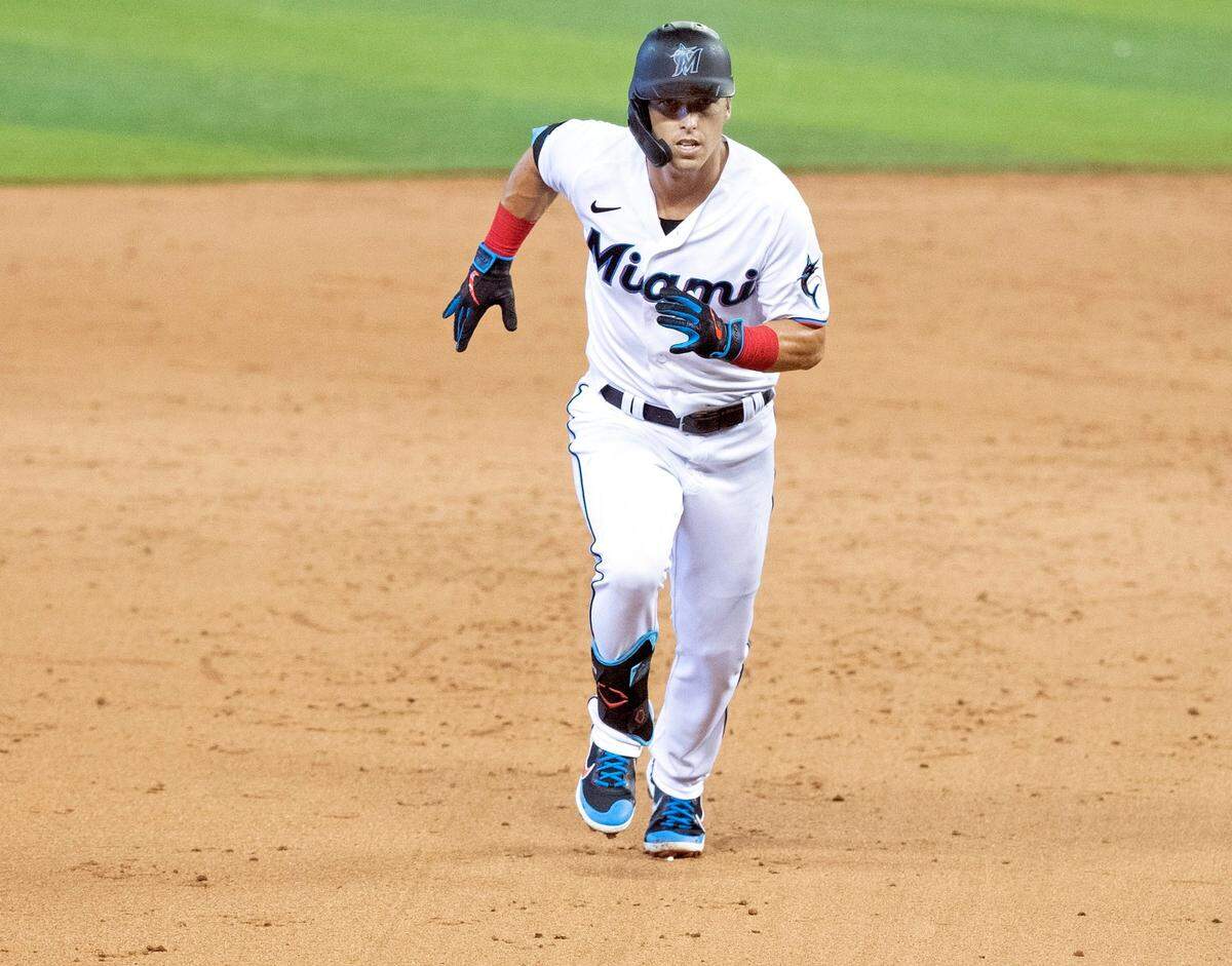Corey Dickerson (23) attempts to advance to third base during Miami Marlins simulated practice game at Marlins Park on Thursday, July 16, 2020.