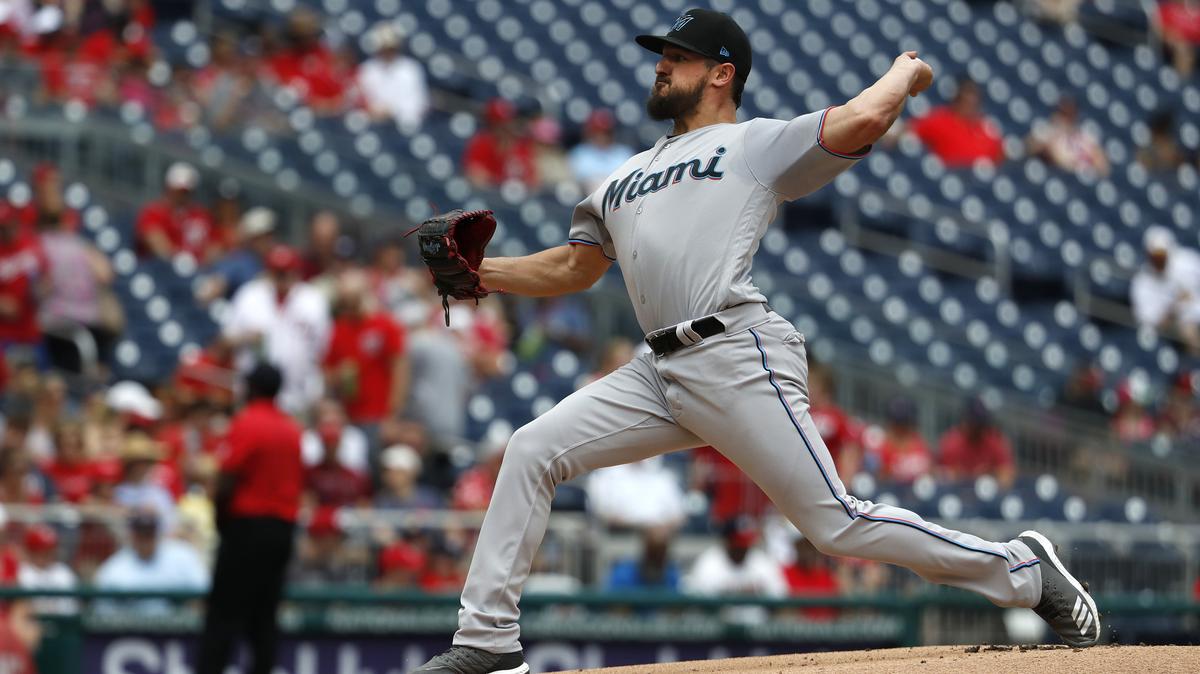 Miami Marlins starting pitcher Caleb Smith winds up against the Washington Nationals in the first inning of a baseball game, Sunday, May 26, 2019, in Washington. (AP Photo/Jacquelyn Martin)
