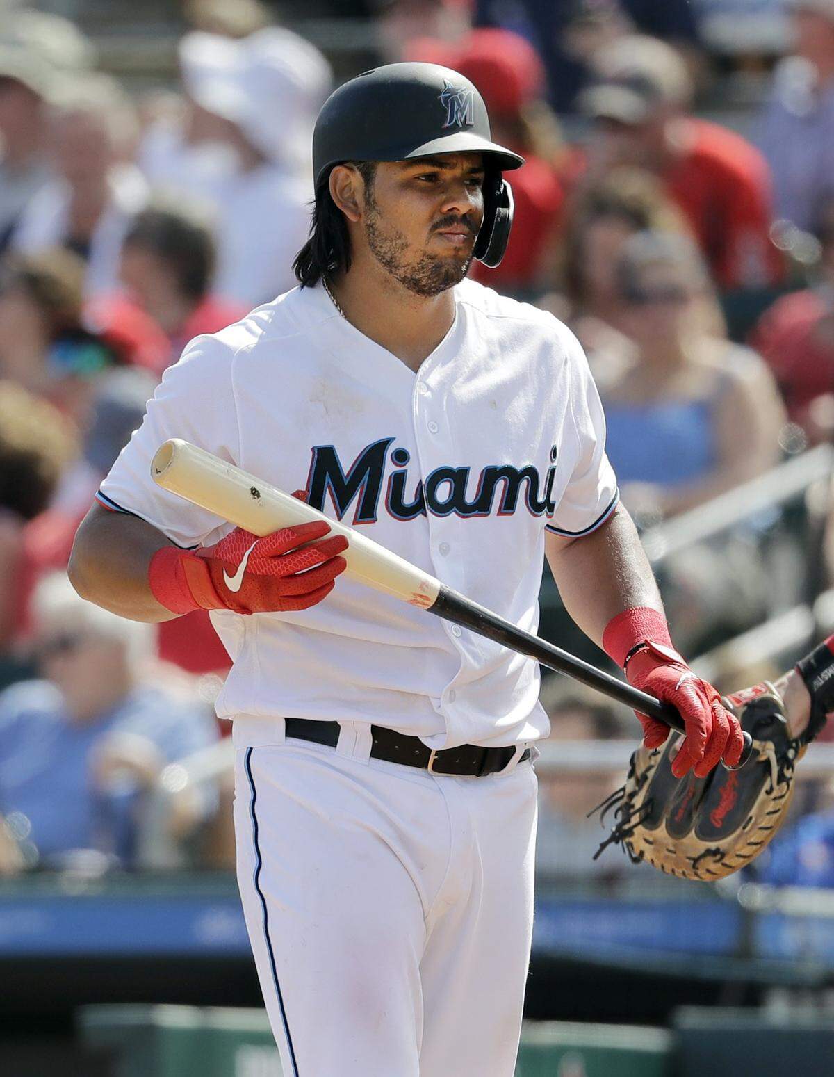 Miami Marlins’ Jorge Alfaro prepares to bat during the second inning of an exhibition spring training baseball game against the St. Louis Cardinals Saturday, Feb. 23, 2019, in Jupiter, Fla. (AP Photo/Jeff Roberson)