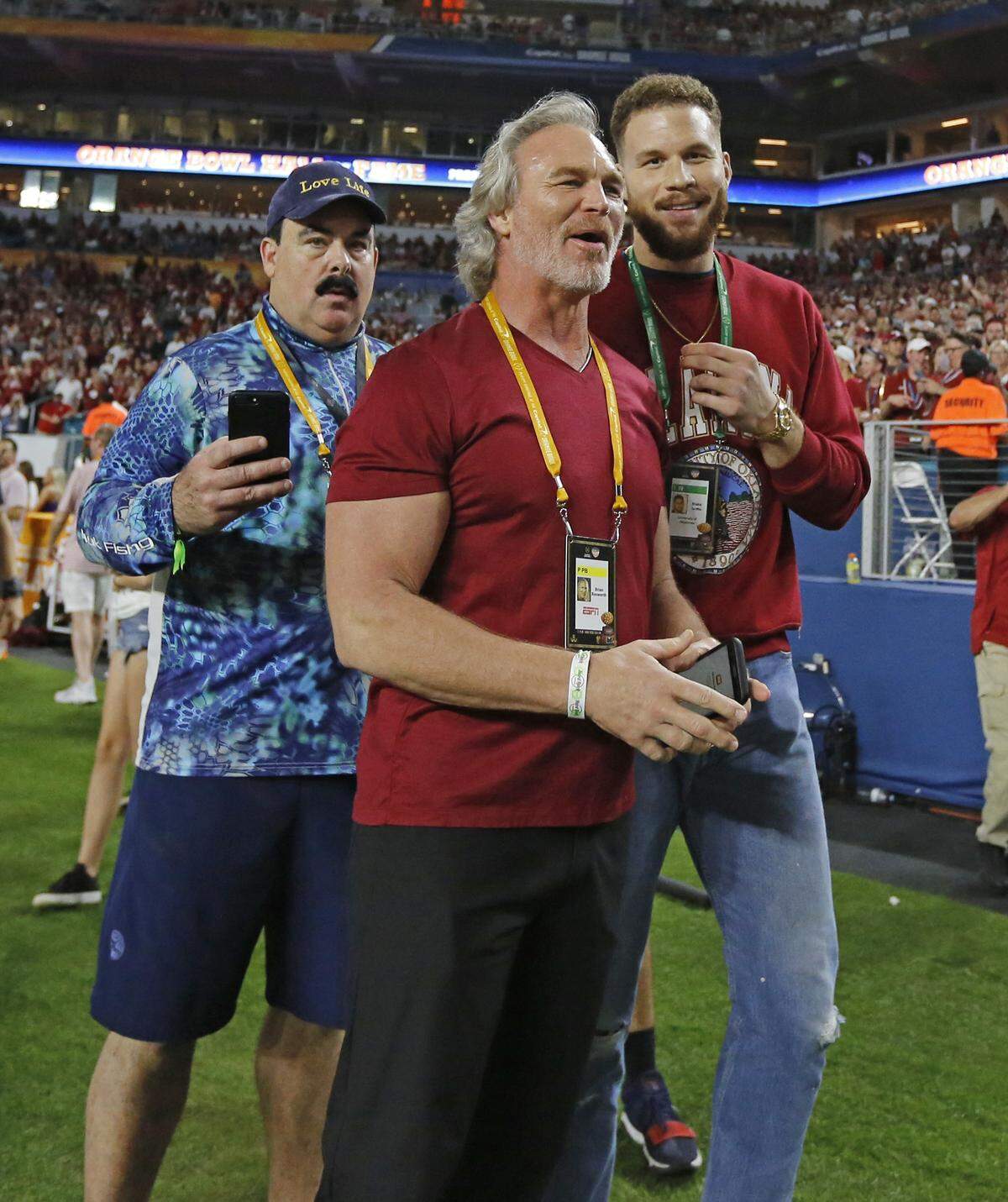 Oklahoma Sooners alumni Brian Bosworth and Blake Griffin before the start of the College Football Playoff Semifinal at the Orange Bowl game against the Alabama Crimson Tide at Hard Rock Stadium on Saturday, December 29 2018, in Miami Gardens.