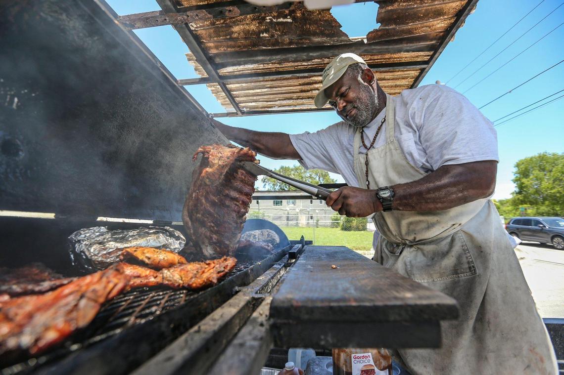 Warren “PeeWee” McNealy, 63, sells barbecue ribs and chicken from the back of his truck along Grand Avenue and Hibiscus Street in Miami’s Coconut Grove on Thursday, June 16, 2022.