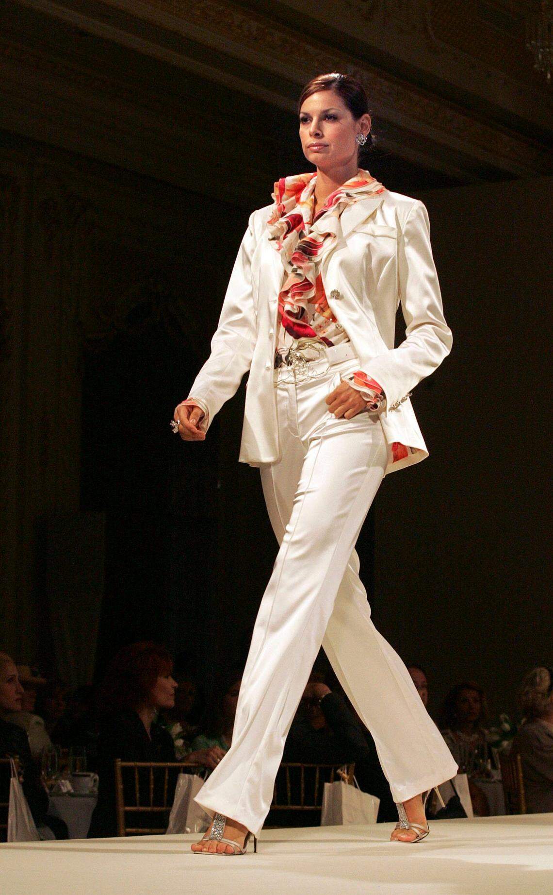 A fashion show model strides along the runway at Mar-a-Lago Club in Palm Beach in 2005.