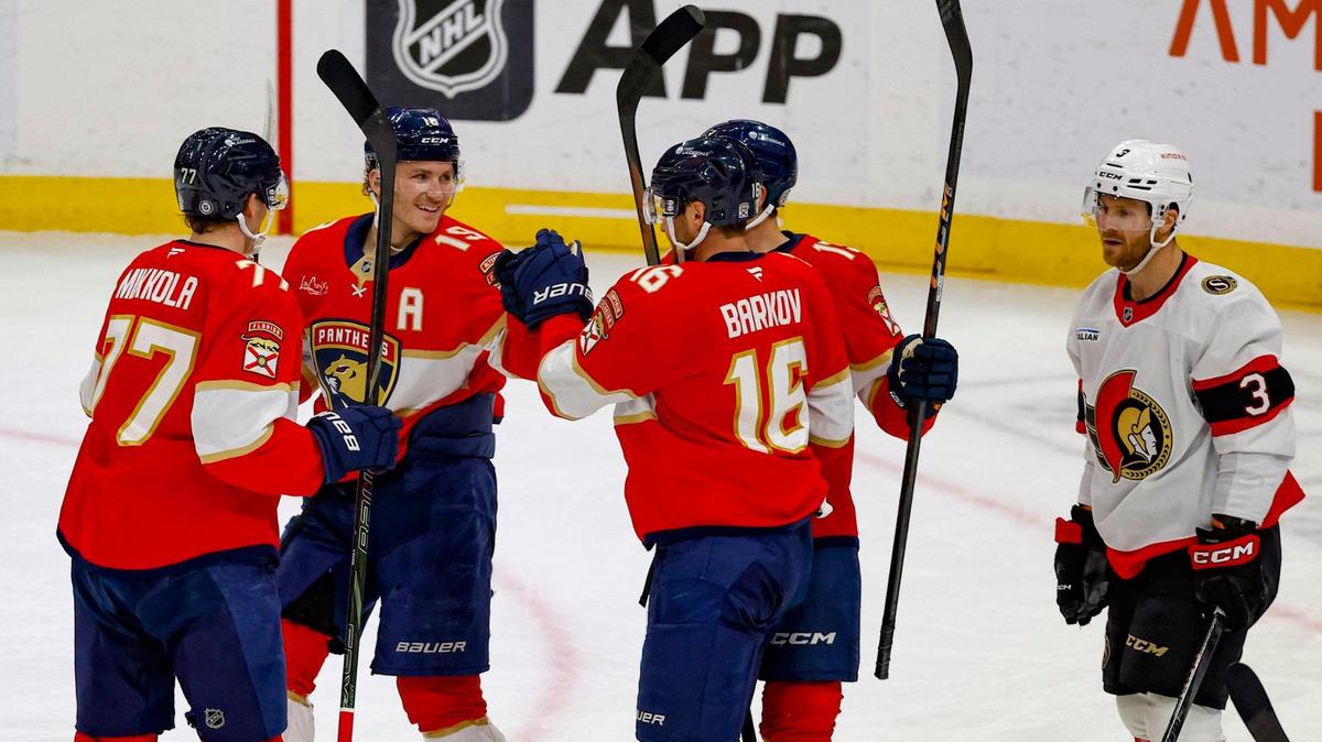 Florida Panthers left wing Matthew Tkachuk (19) and Florida Panthers center Aleksander Barkov (16) and teammates celebrate after scoreing against the Ottawa Senators in the second period during their NHL Hockey match at Amerant Bank Arena in Sunrise, Florida on Saturday, February 8, 2025.