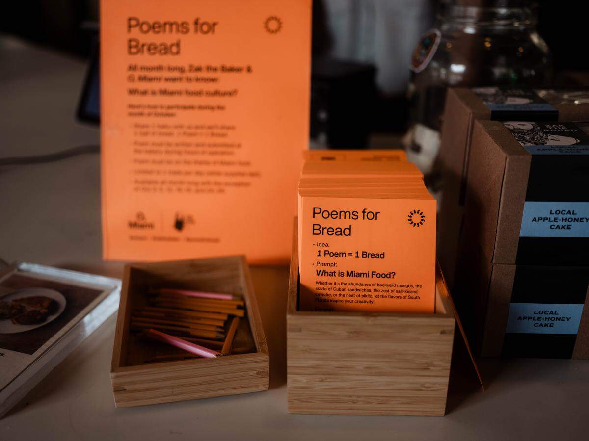 Write your haiku on one of these orange cards at Zak the Baker’s and trade it for a loaf of bread.