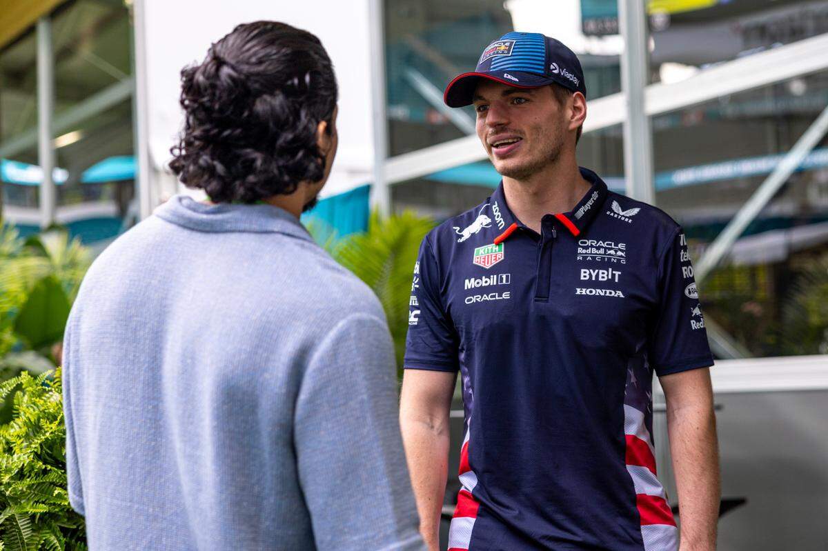 Red Bull Racing driver Max Verstappen speaks with American actor Danny Ramirez outside the Red Bull Team Village during the Formula One Miami Grand Prix at the Miami International Autodrome on Friday, May 3, 2024, in Miami Gardens, Fla.