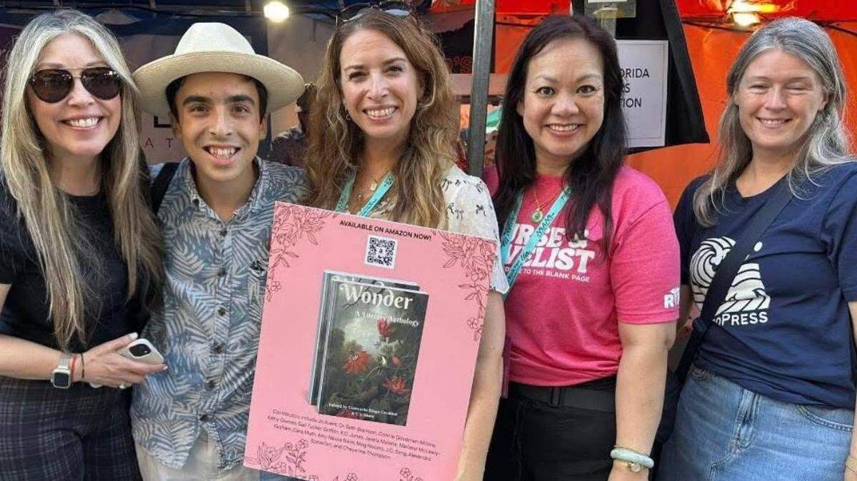 C.V. Shaw, Giancarlo Diago Cevallos, Amy Nicole Naim, J.C. Sang, and Jo Avent celebrate their writing in the new book ‘Wonder, A Literary Anthology’ at the Miami Book Fair.