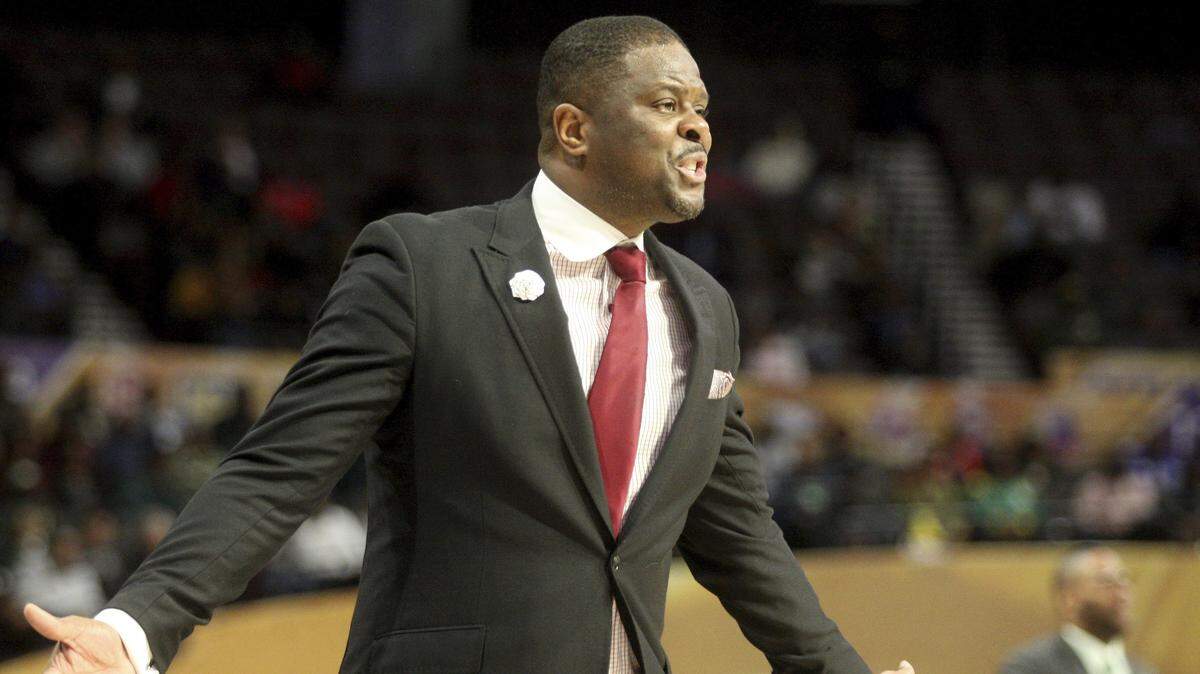 North Carolina Central coach LeVelle Moton directs his team during an NCAA college basketball game against Norfolk State in the championship of the Mid-Eastern Athletic Conference tournament, Saturday, March 16, 2019, in Norfolk, Va. (AP Photo/Jason Hirschfeld)