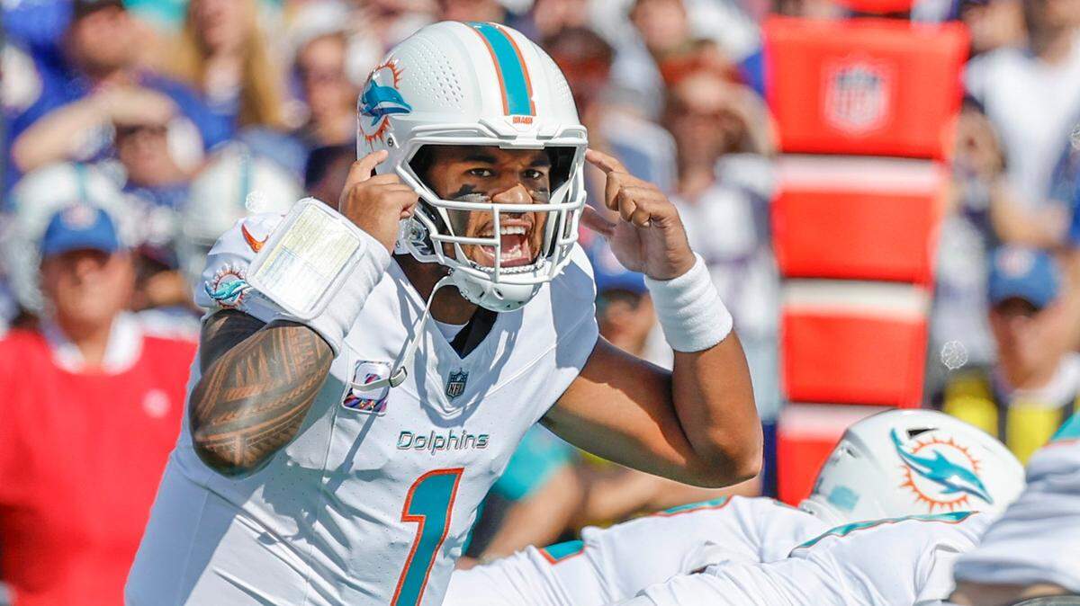 Miami Dolphins quarterback Tua Tagovailoa (1) calls out a signal during the game against the Buffalo Bills in the first half at Highmark Stadium in Orchard Park, NY., on Sunday, October 1, 2023.