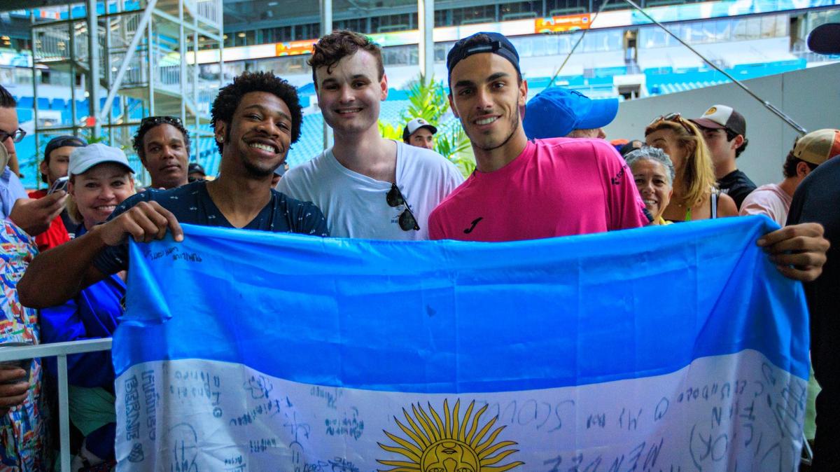 Francisco Cerundolo of Argentina poses with friends from New York David Taylor and Will Hogan after his match against Jannik Sinner of Italy during the Miami Open tennis tournament at Hard Rock Stadium on Wednesday, March 30, 2022 in Miami Gardens, Fl. Taylor and Hogan trained with Francisco at his father’s Academy, Club Ciudad in Buenos Aires in 2014.