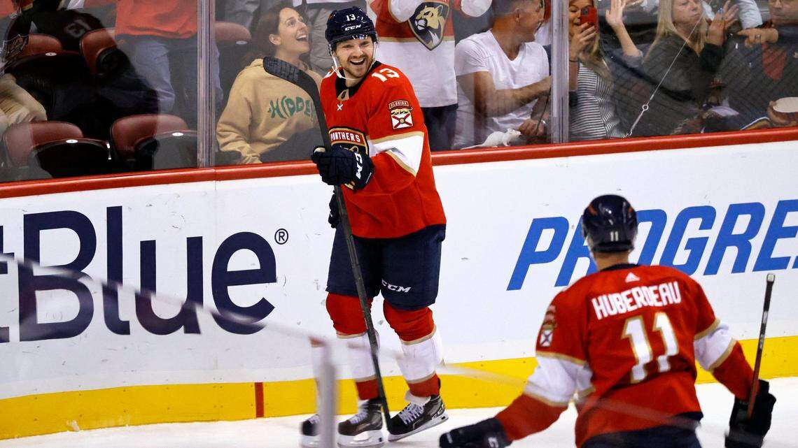 Florida Panthers center Sam Reinhart (13) celebrates with teammate Panthers left wing Jonathan Huberdeau (11) after scoring a goal on a power play against Philadelphia Flyers goaltender Carter Hart (79) during the first period of an NHL game at the FLA Live Arena on Thursday, March 10, 2022 in Sunrise, Fl.
