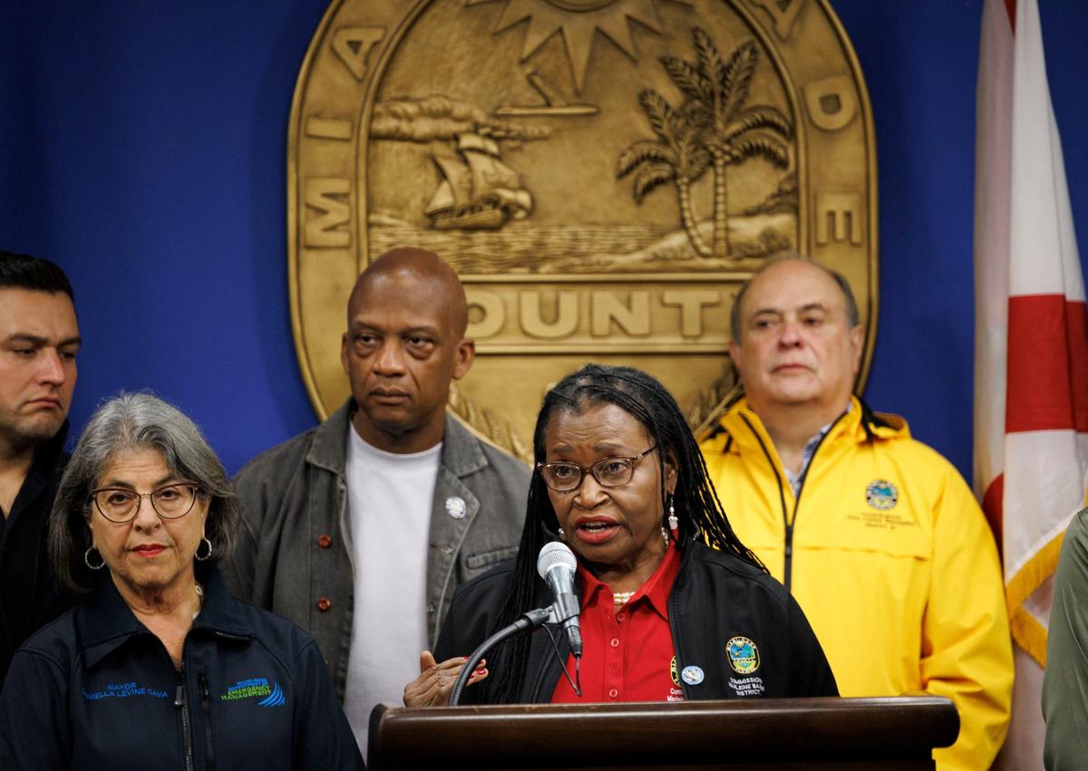 Commissioner Marleine Bastien, center, addresses the public while, from left to right, Mayor Daniella Levine-Cava and Commissioners Oliver G. Gilbert and Juan Carlos Bermudez listen during a press conference discussing what Miami-Dade is doing for Hurricane Milton on Monday, Oct. 7, 2024, at the county Emergency Operations Center in Doral, Fla.